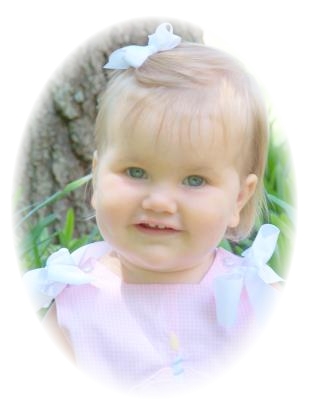 Abby models our Medium toddler hairbow