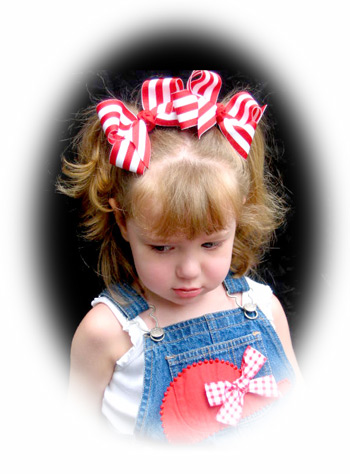 Kendall models our striped big girl bow (small)